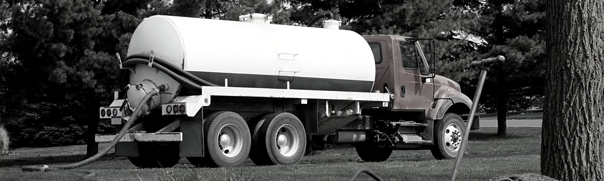 septic tank truck pumping a septic tank 